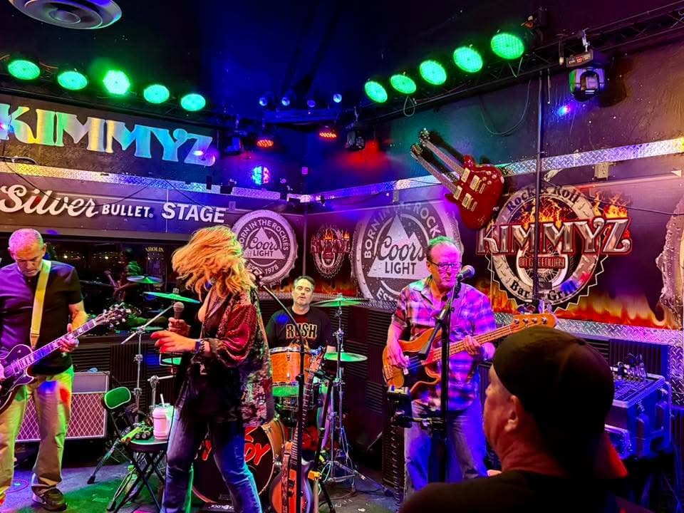 Rock Steady full band performing on a Phoenix stage
