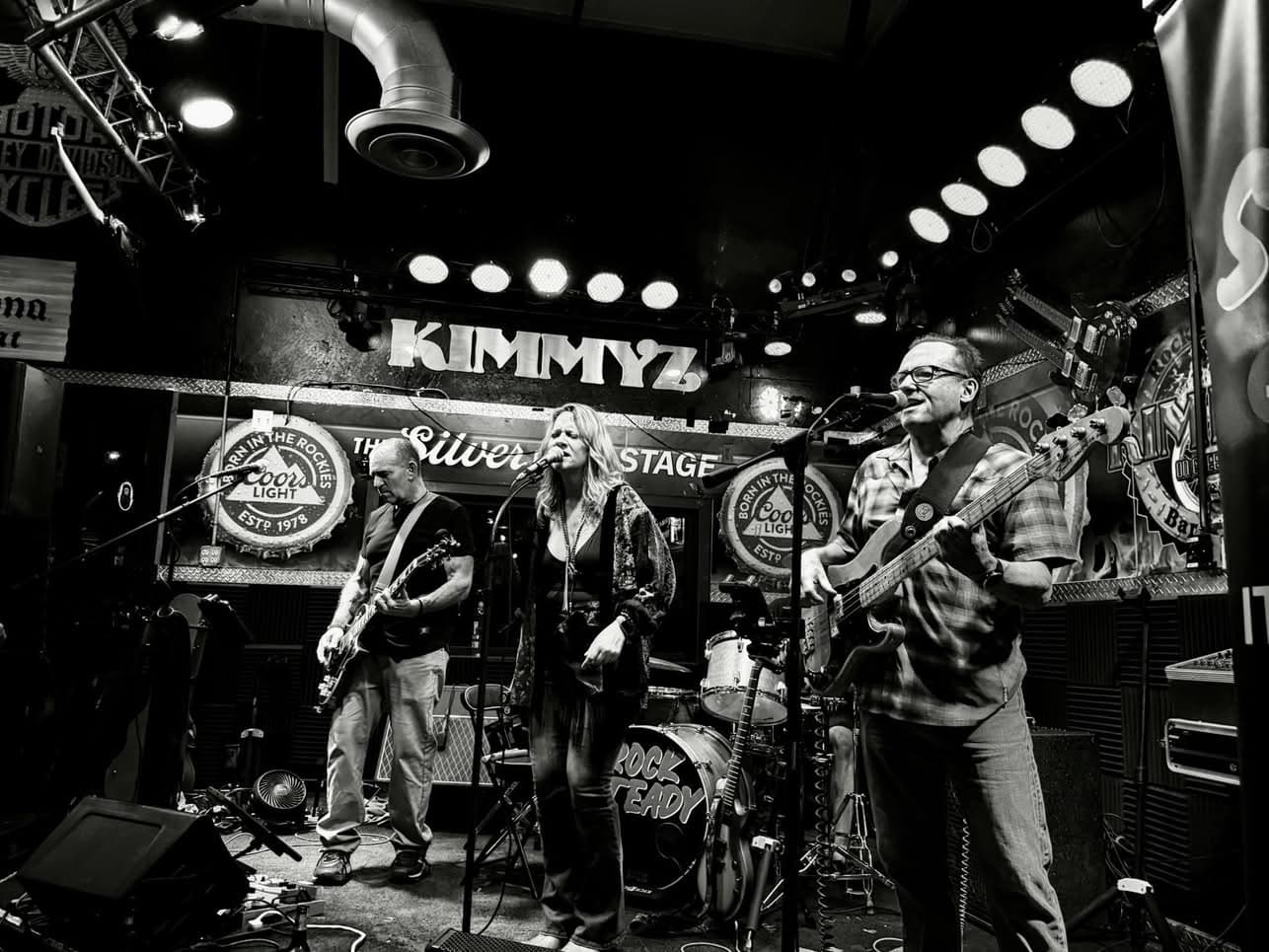 Rock Steady full band performing in black and white